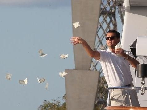Leonardo DiCaprio throwing Money 